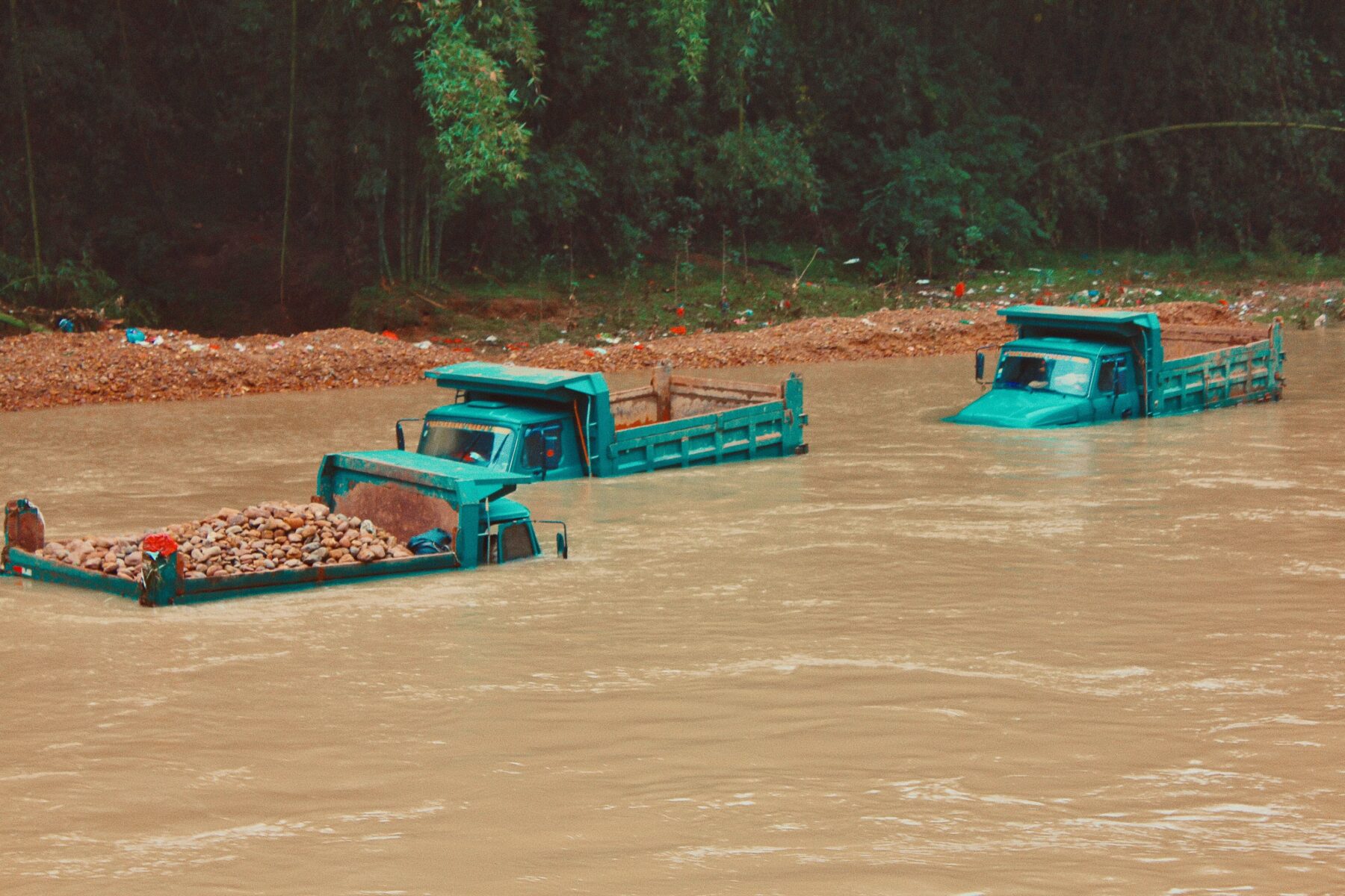 trucks in floods